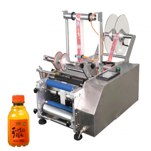 半自動果汁瓶貼標(biāo)機